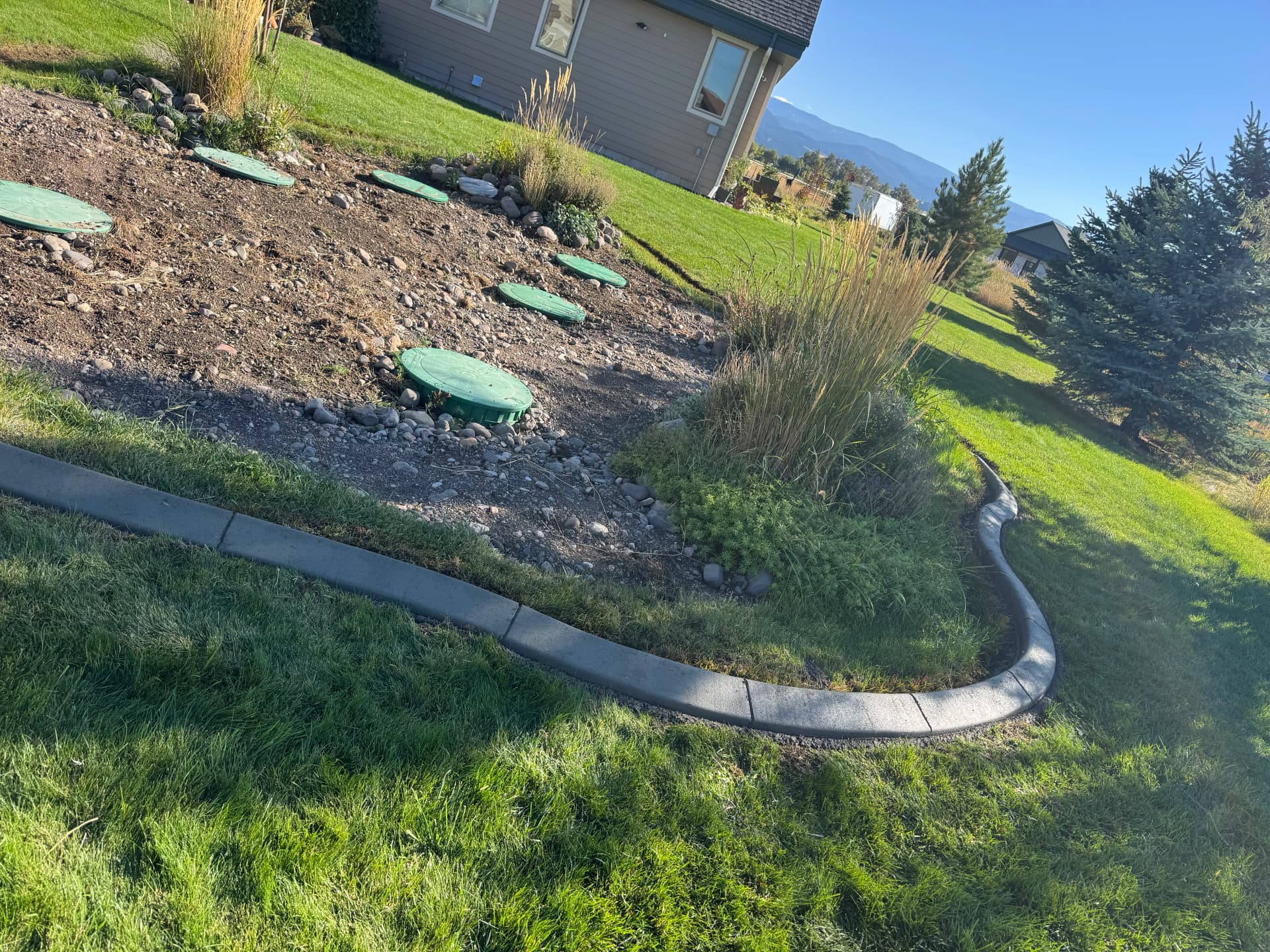 Gallery photos for Concrete Curbing Gives This Bozeman Yard a Sharp, Clean Edge: Image #2