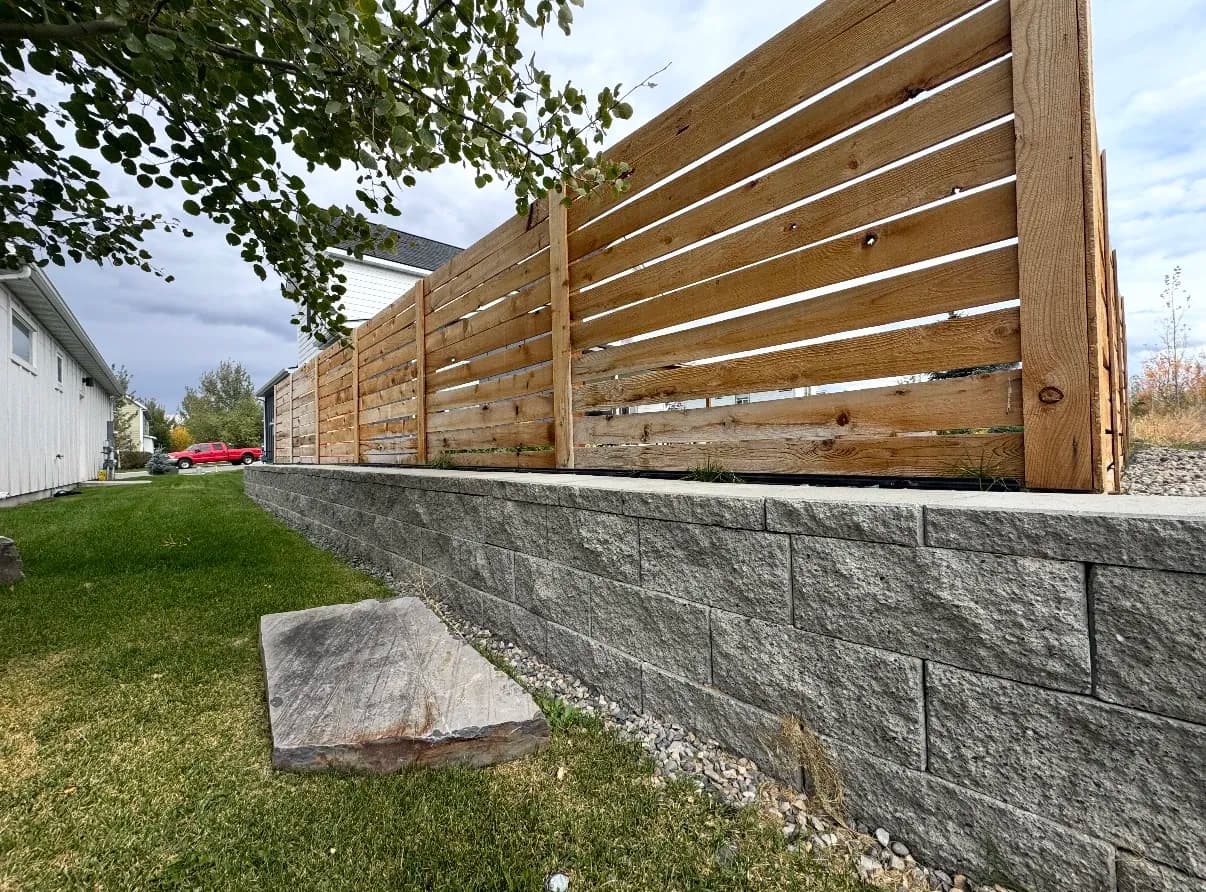 Retaining Wall and Fence Combo Built for a Bozeman Yard image