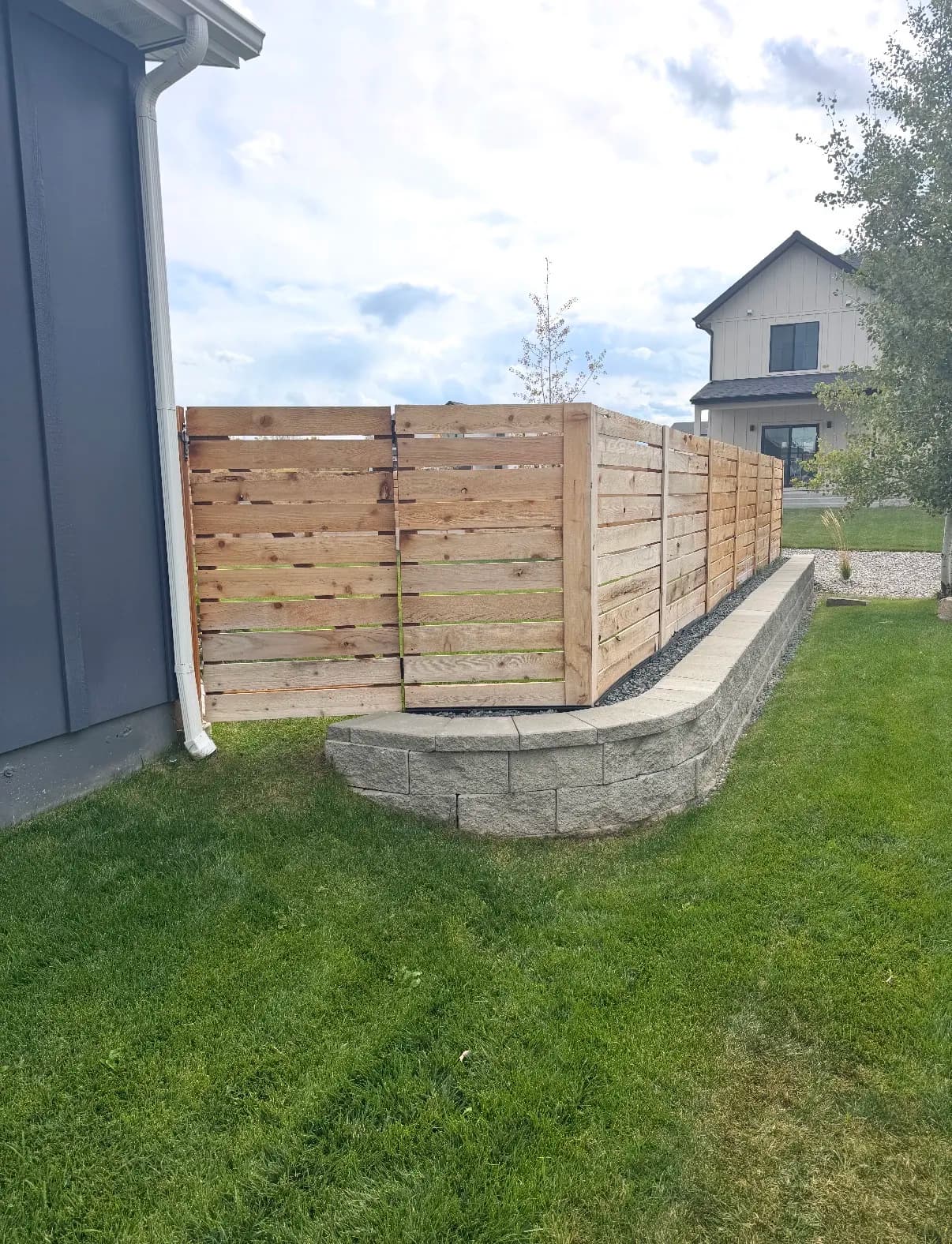 Gallery photos for Retaining Wall and Fence Combo Built for a Bozeman Yard: Image #1