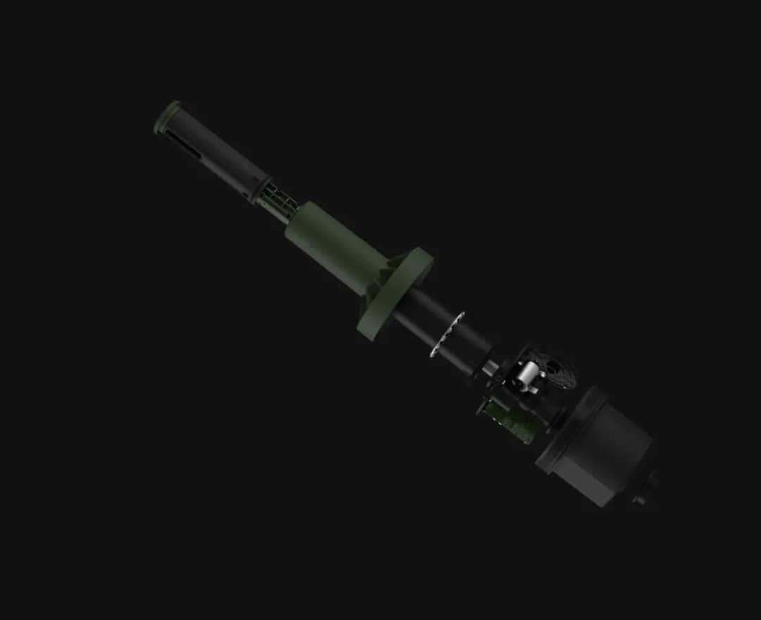 3D rendering of a green military-style suppressor with detailed components on a dark background.