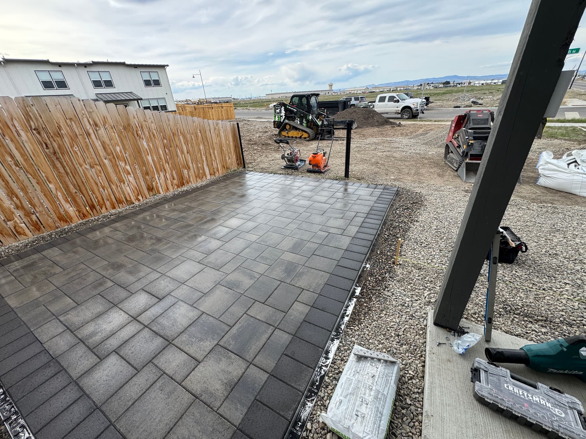 Gallery photos for From Gravel Lot to Clean Backyard Paver Patio: Image #1